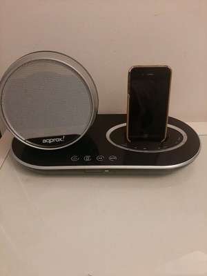 I phone old with charging dock and speaker used, collectible