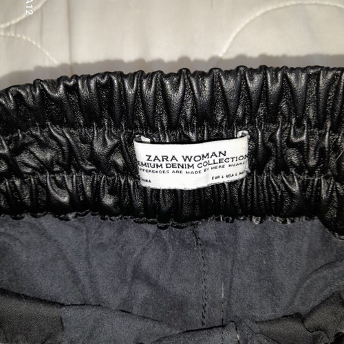 Zara black faux leather pants with silver zippers, new, size L