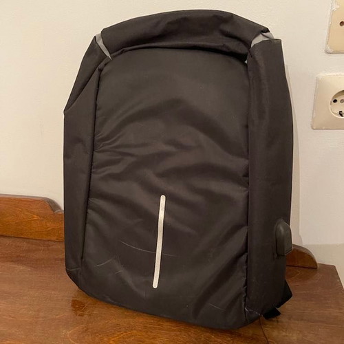 Backpack used, black with anti-theft zipper design
