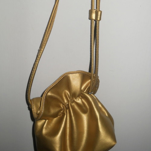 Handheld pouch bag used in excellent condition