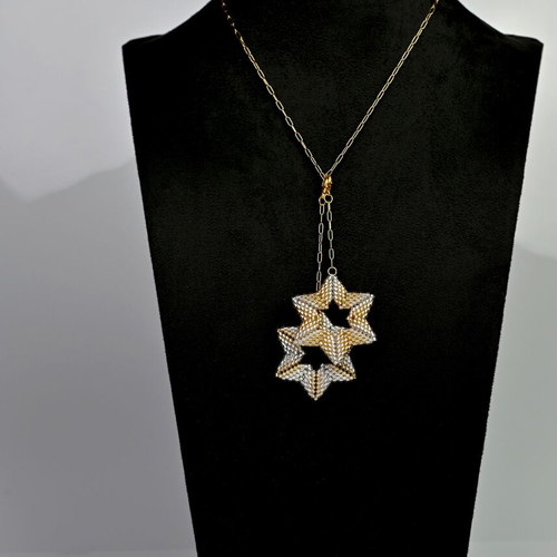 Necklace with two star pendants in white and gold custom made