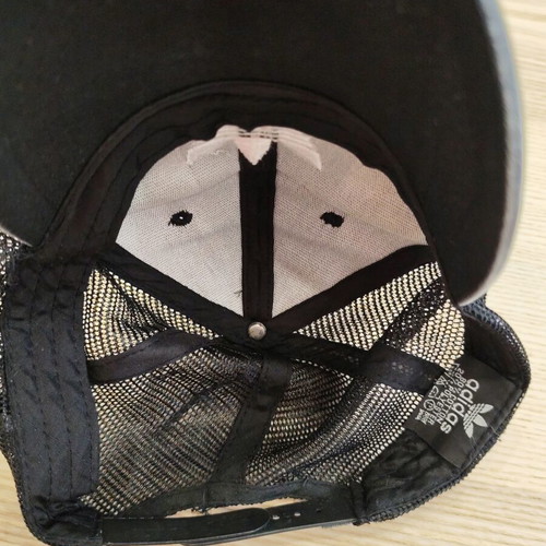 Adidas Originals black trucker cap with white trefoil logo