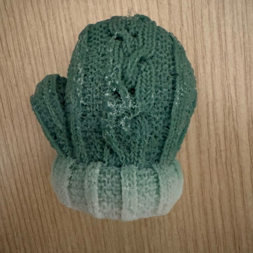 Green candle in glove shape new