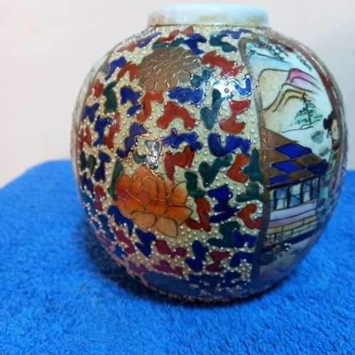 Satsuma vase used with handpainted floral motifs and crackle glaze