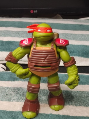 TMNT Nickelodeon Flingers Michelangelo action figure used with mechanism