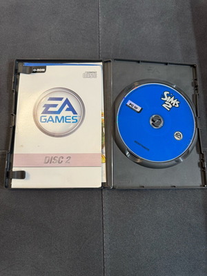 Sims 2 PC like new, includes both CDs