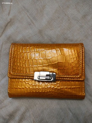 Leather women's wallet used with ergonomic design