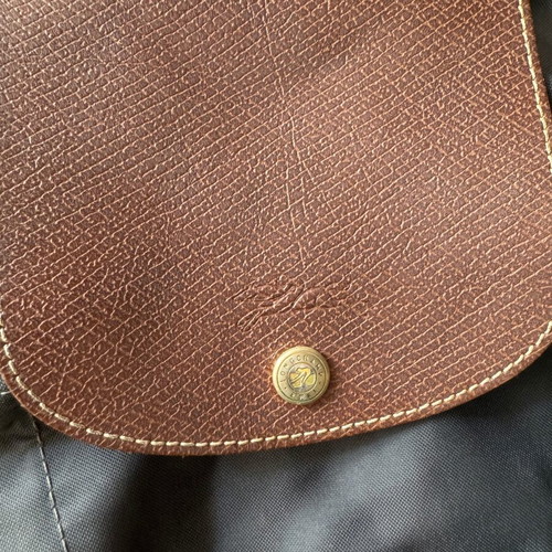 Longchamp backpack used, zipper needs repair, beige and gray