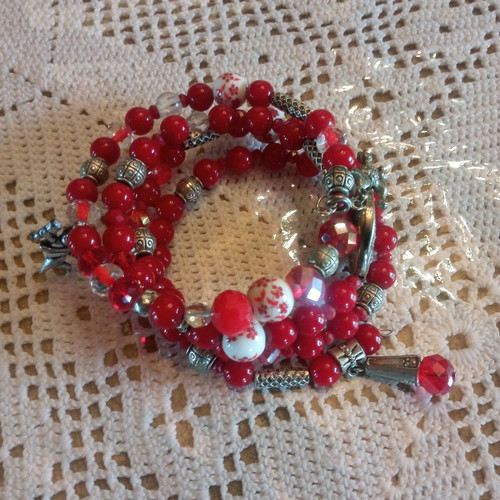 Handmade bracelet with red beads and multiple strands, new