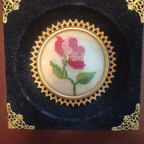 Set of 3 embroidered textile paintings in velvet frames
