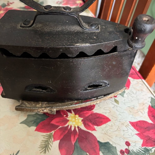 Iron with base and charcoal used