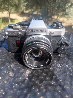 Olympus OM-10 film camera with Zuiko 50mm f/1.8 lens