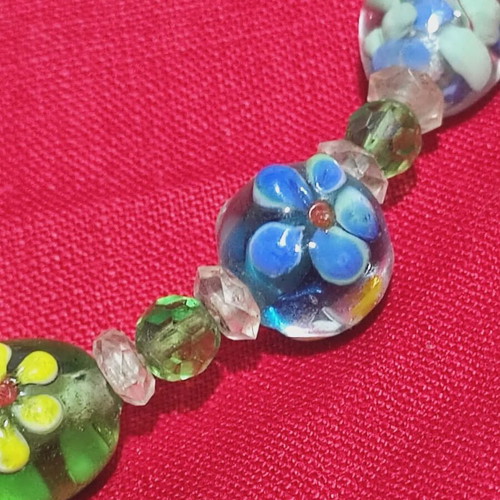 Necklace with glass beads used, blown glass with flower designs