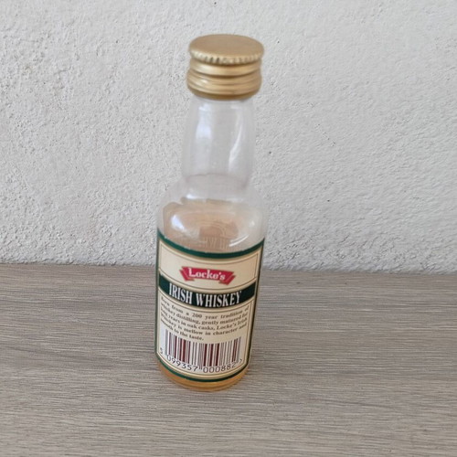Locke's Irish Whiskey small promotional bottle used