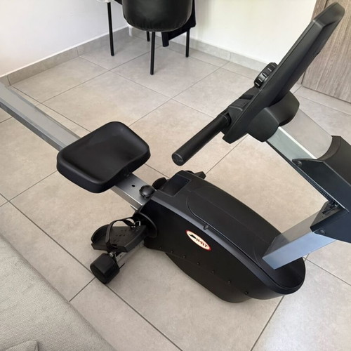 X-FIT rowing machine used with magnetic resistance and LCD display