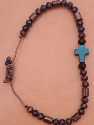 Small bracelet with cross like new, black and blue