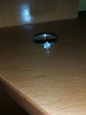 Silver solitaire ring