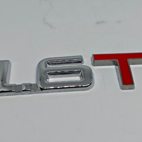Metal Turbo 1.6T Car Emblem chrome with red, like new