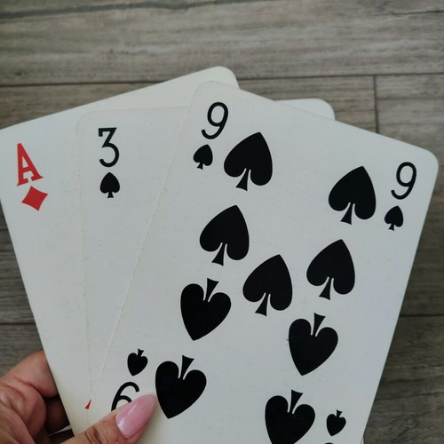 Two playing card decks like new, one small and one large