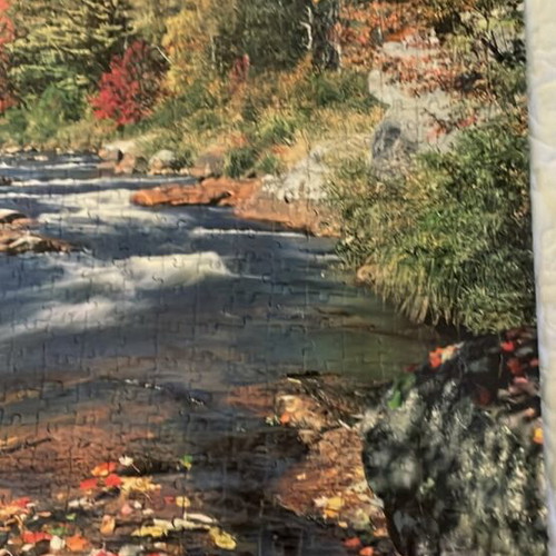 Puzzle board like new with river landscape and blooming tree