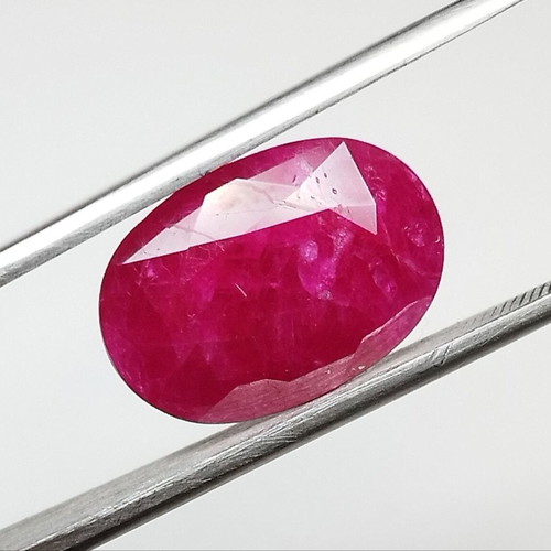 Ruby 10.54 carat hot pinkish red from Mozambique new