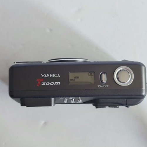Yashica T Zoom 35mm film camera new with Carl Zeiss lens