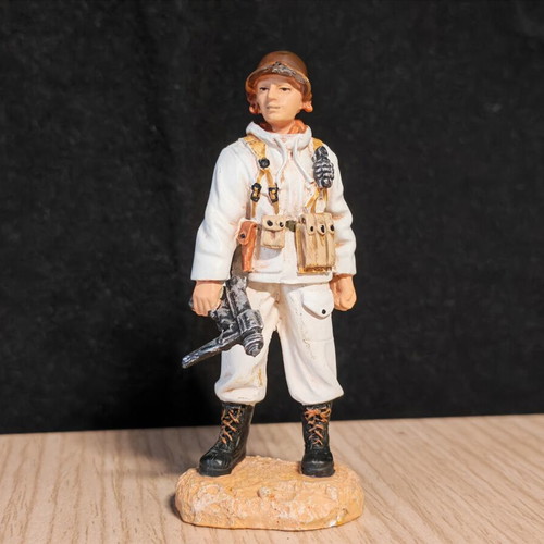 Collectible miniature figure of American soldier in winter camouflage, like new