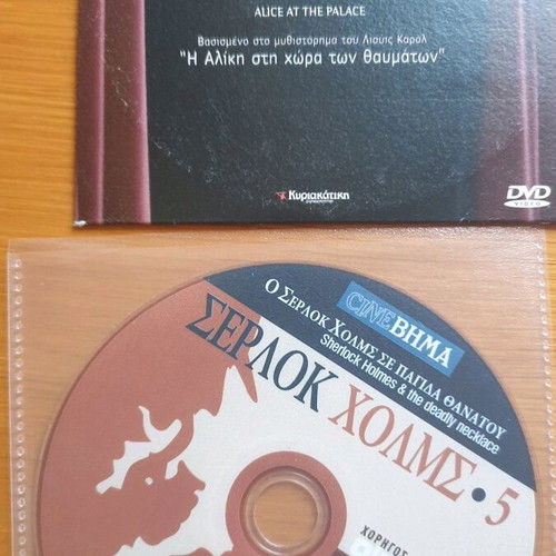 DVD pack of 55 new, 40 in hard case and 15 in paper