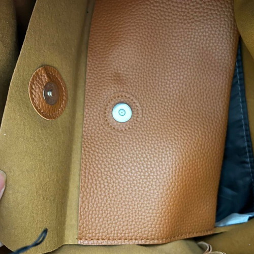 Brown shoulder bag with flap used