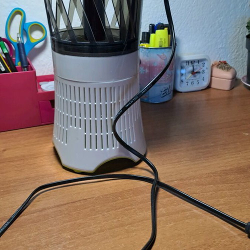 Electric insect trap used, works with power