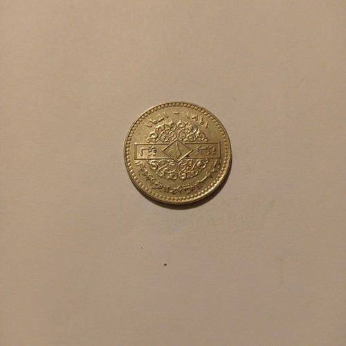 Rare coins used, possibly Libya, very good condition