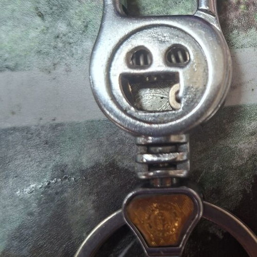 Metal keychain like new, silver gray