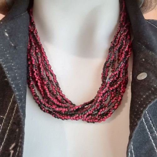 Boho style bronze necklace with small resin beads in burgundy and black