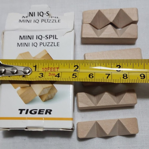 3D Wooden Burr Puzzle like new, compact brain teaser