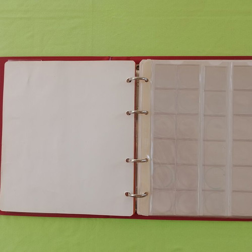 Coin album used with 5 slides for 133 coins