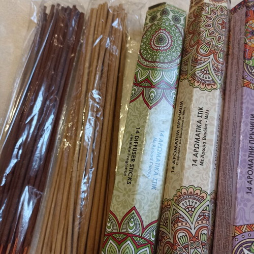 Aromatic incense sticks with wooden base, assorted scents