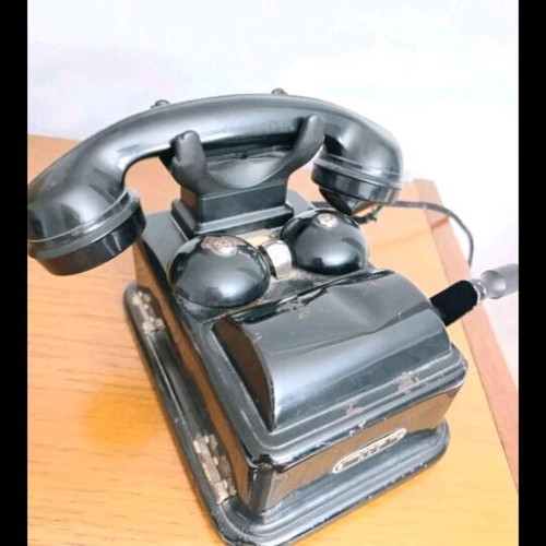 Standard Budapest antique analog telephone with crank used