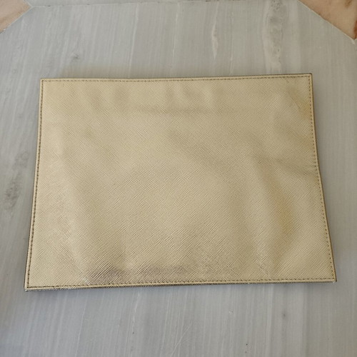 Givenchy pouch like new, gold