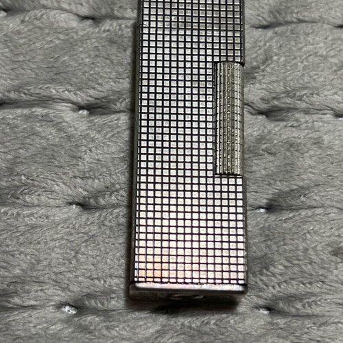 Silver lighter used with gas