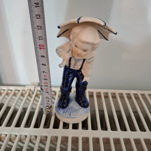 Handmade ceramic figurine girl with umbrella blue Delft like new