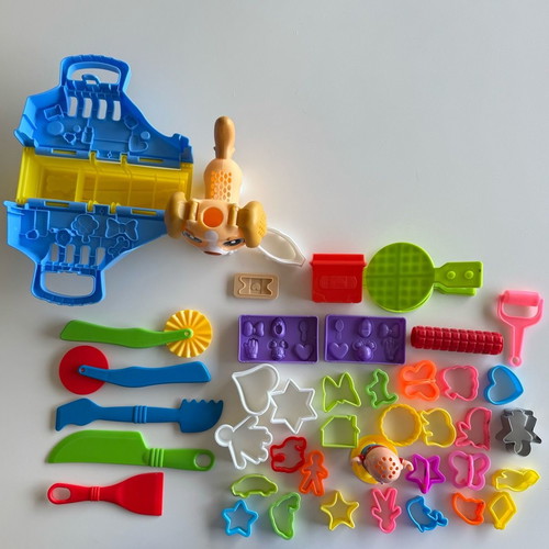 Play Doh Care and Carry Vet Playset used with modeling accessories