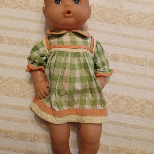 Large Famosa doll used with stain on dress