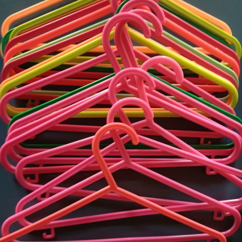 Set of 19 plastic children's hangers like new, multicolored