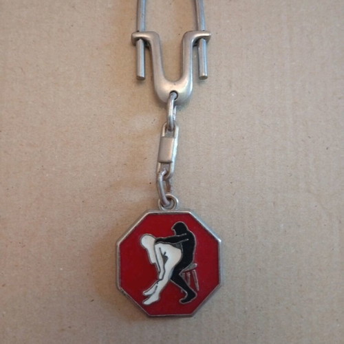 Vintage keychain like new with schematic sexual position design