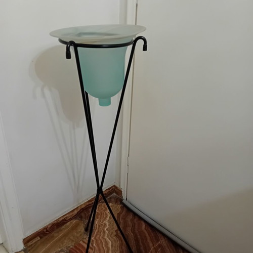 Handmade metal floor plant stand with glass blue-green container, used