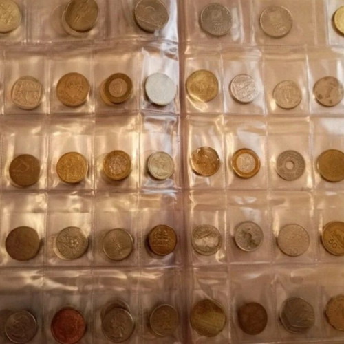 Coin album used with 159 coins from various countries