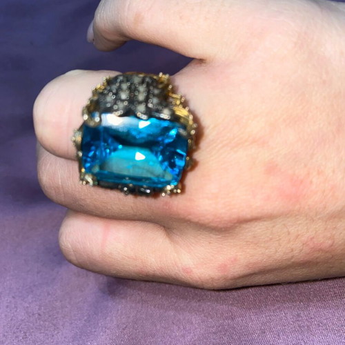 Silver ring plated with 9K gold, like new, blue topaz center
