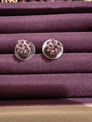 Stud earrings with purple stones like new