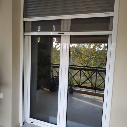 Aluminum window frames with shutters and double glazing