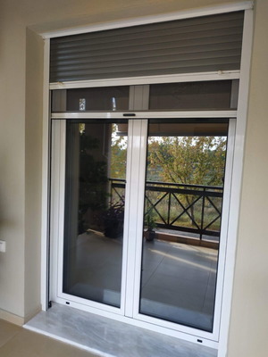 Aluminum window frames with shutters and double glazing
